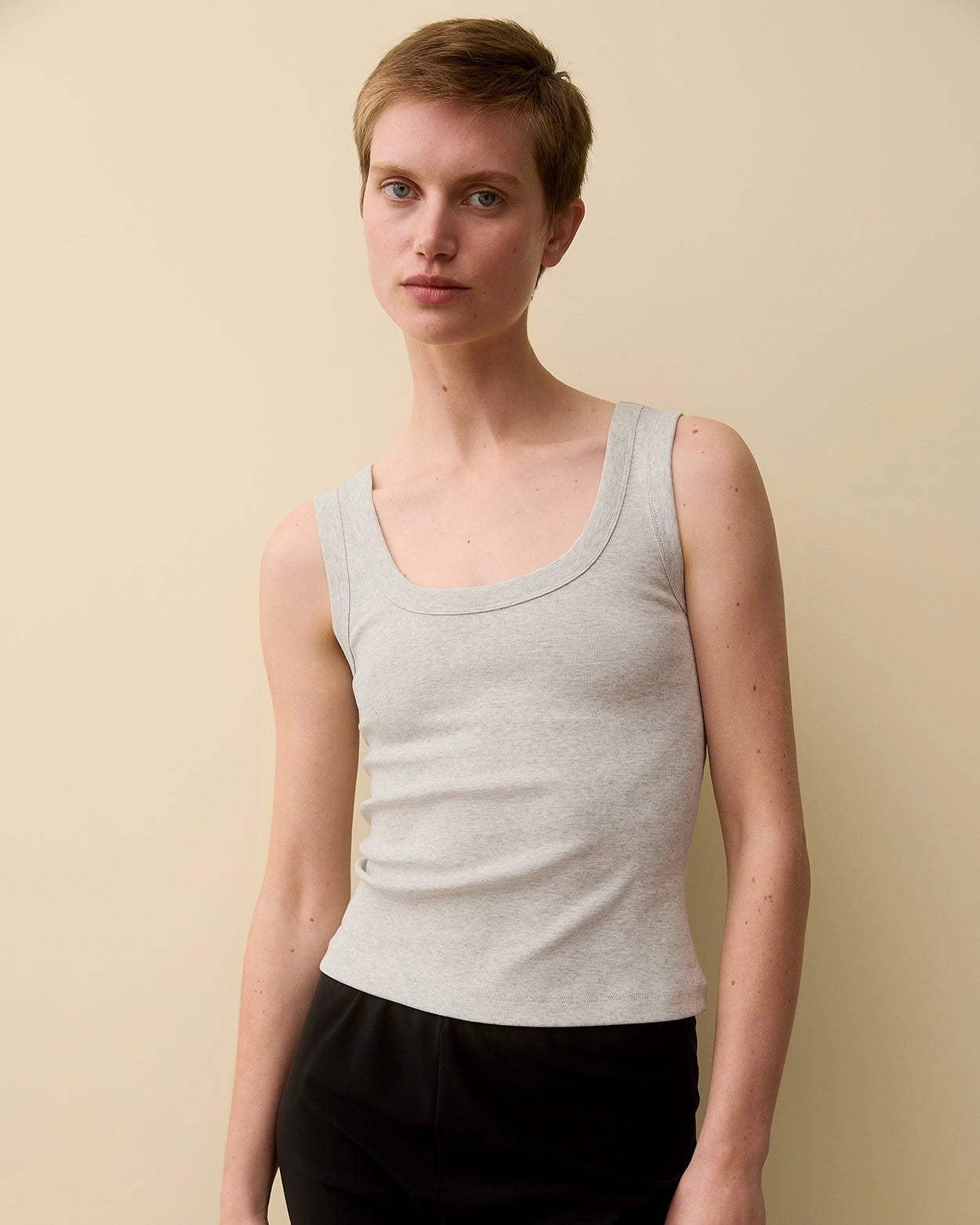 Model wearing Hillie Tank in Heather Grey by FLORE FLORE