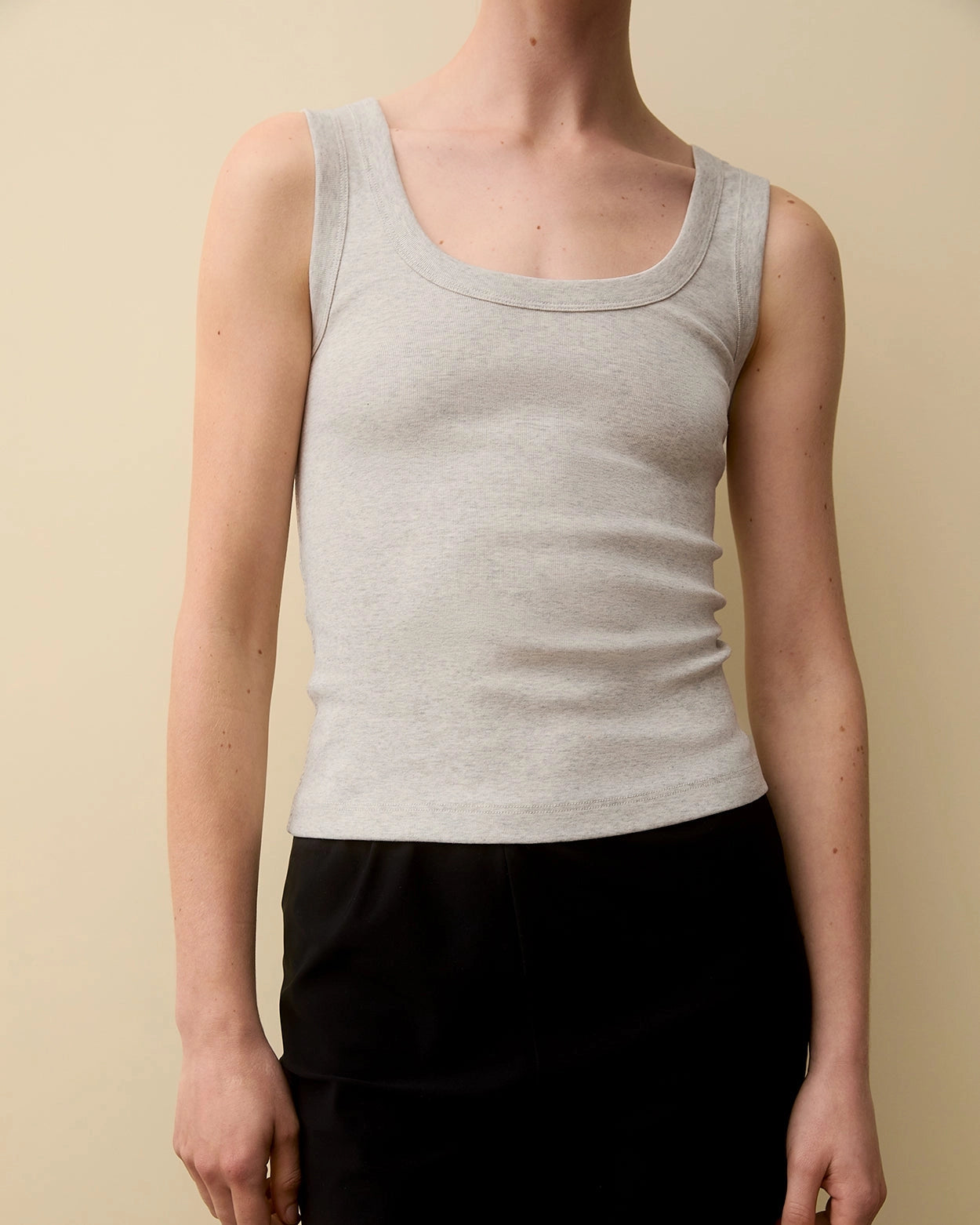 Model wearing Hillie Tank in Heather Grey by FLORE FLORE