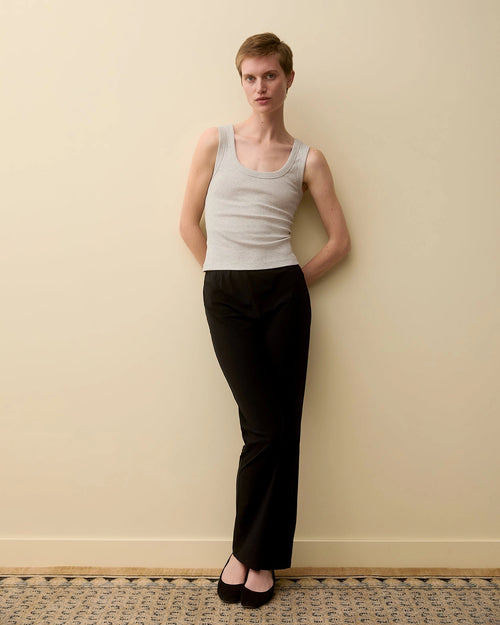 Model wearing Hillie Tank in Heather Grey by FLORE FLORE