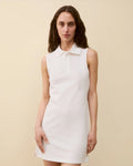 Model wearing Lauren Polo Dress in White by FLORE FLORE front view