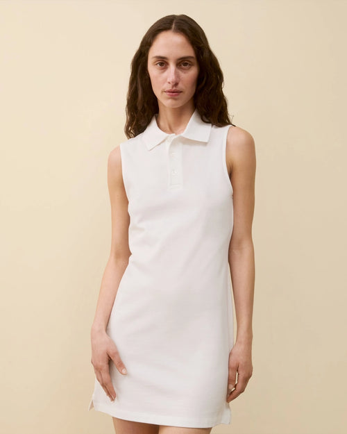 Model wearing Lauren Polo Dress in White by FLORE FLORE front view