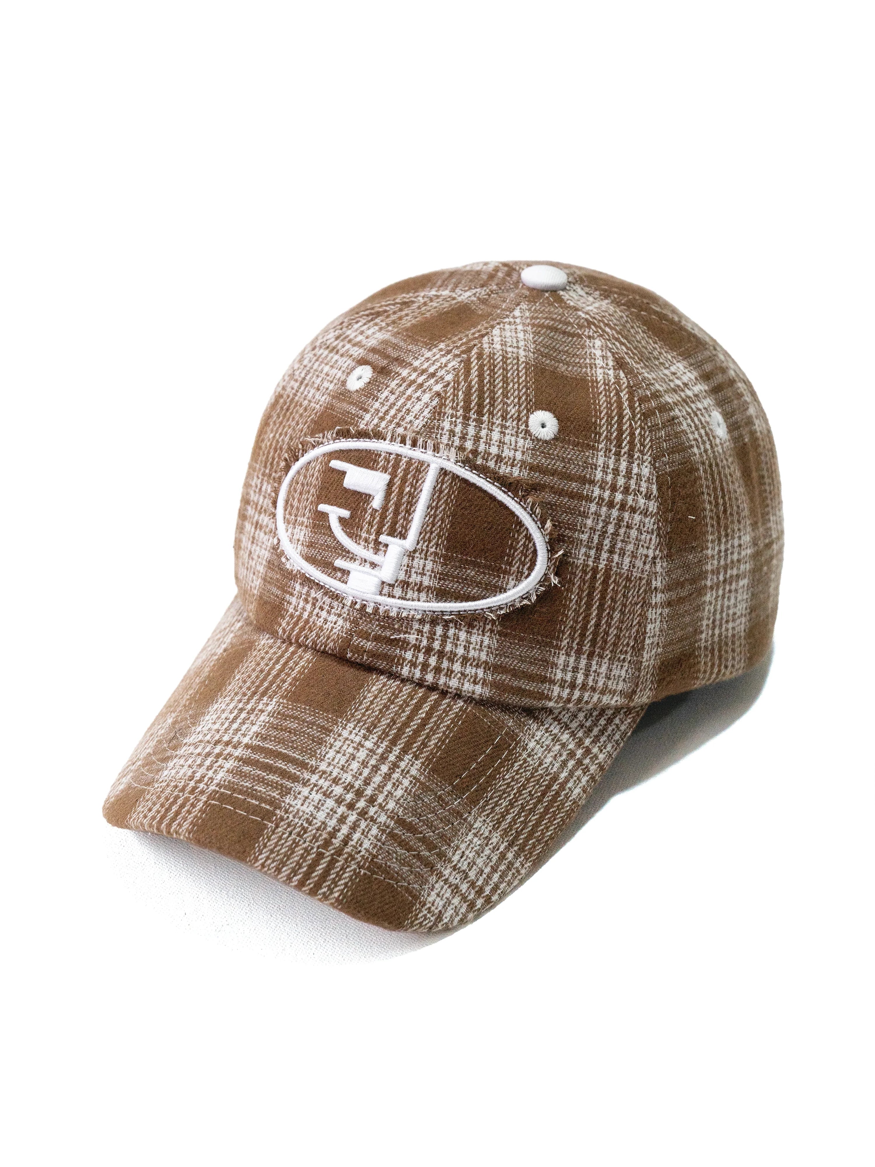 Smiling Bauhaus Plaid Cap in Brown by Henry Johnson