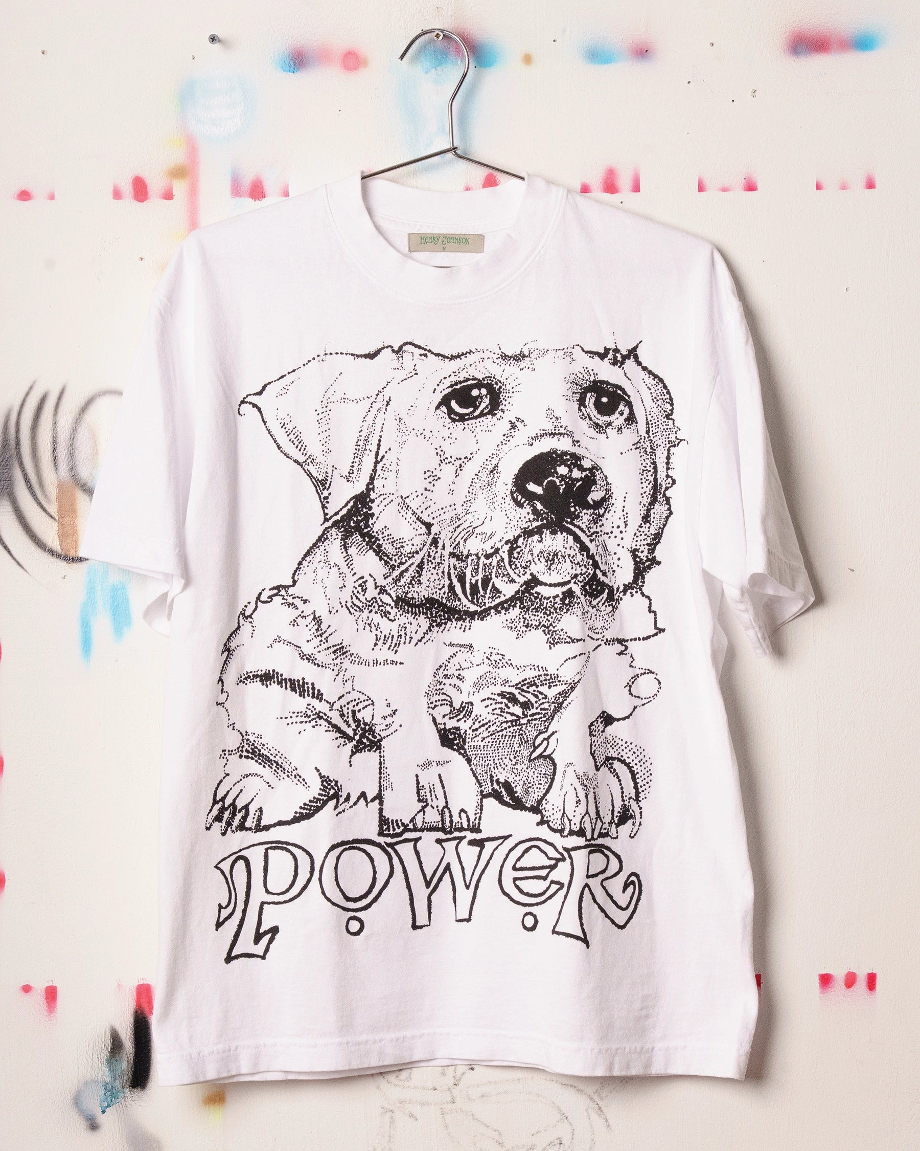 White Henry Johnson graphic tee with oversized black dog illustration and POWER lettering on the front.
