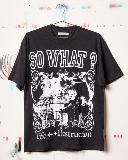 Black Henry Johnson graphic tee with oversized SO WHAT? typography, distressed artwork and Life ↔ Destruction lettering on the front.