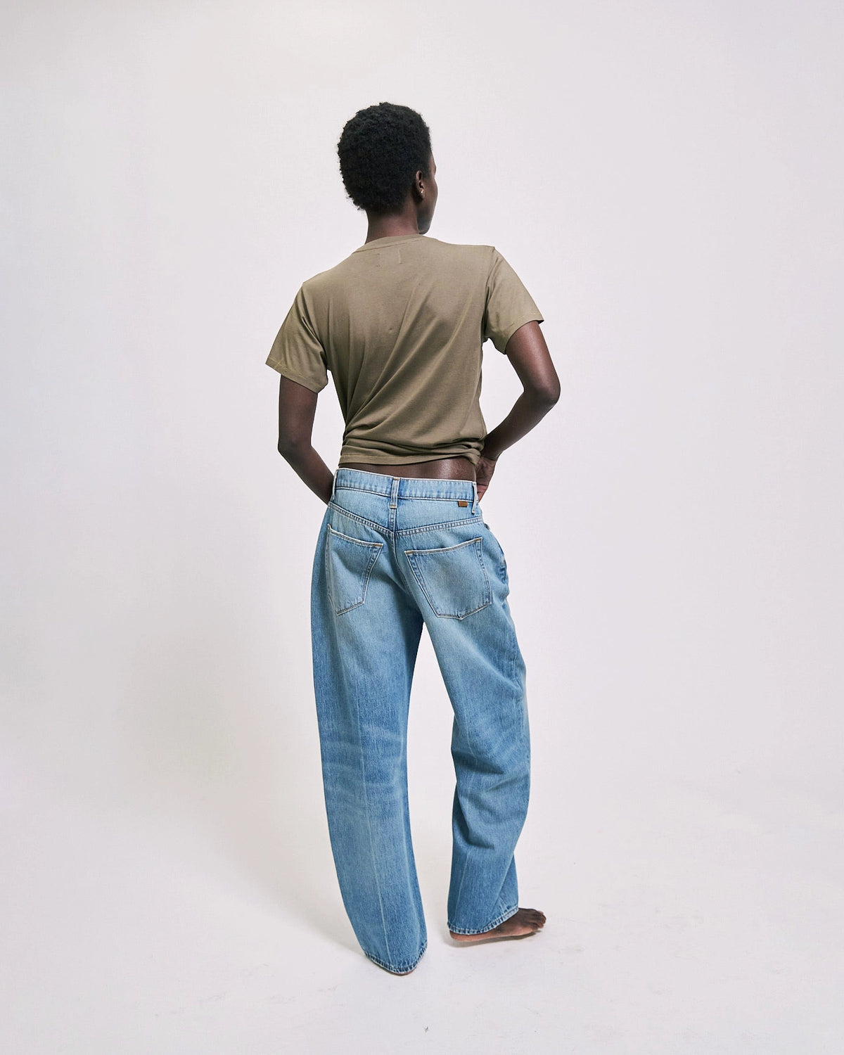 Model wearing The Crop Loose jean in deep blue by Jamie Haller.