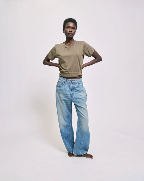 Model wearing The Crop Loose jean in deep blue by Jamie Haller.