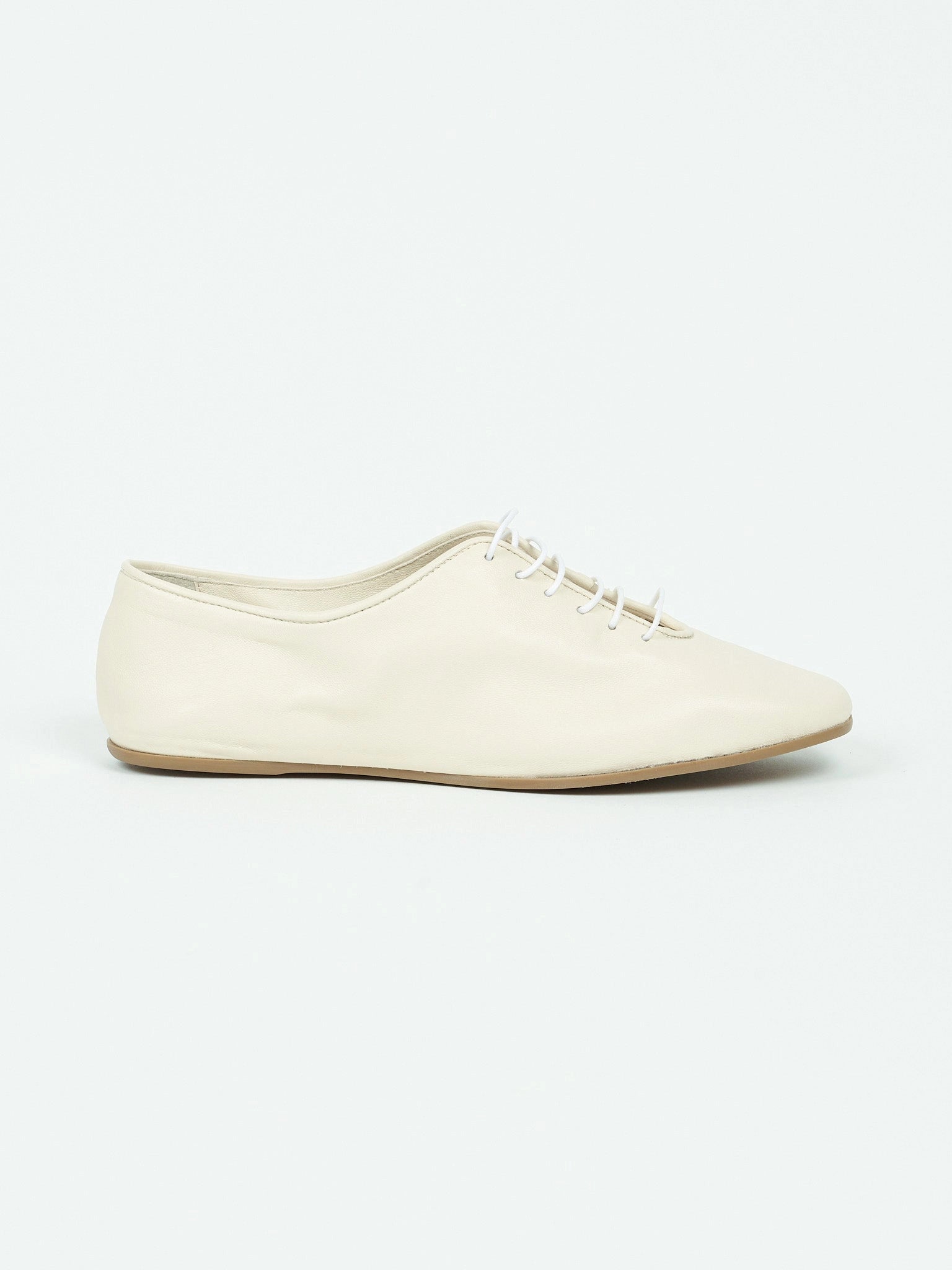 White leather shoe on a white background