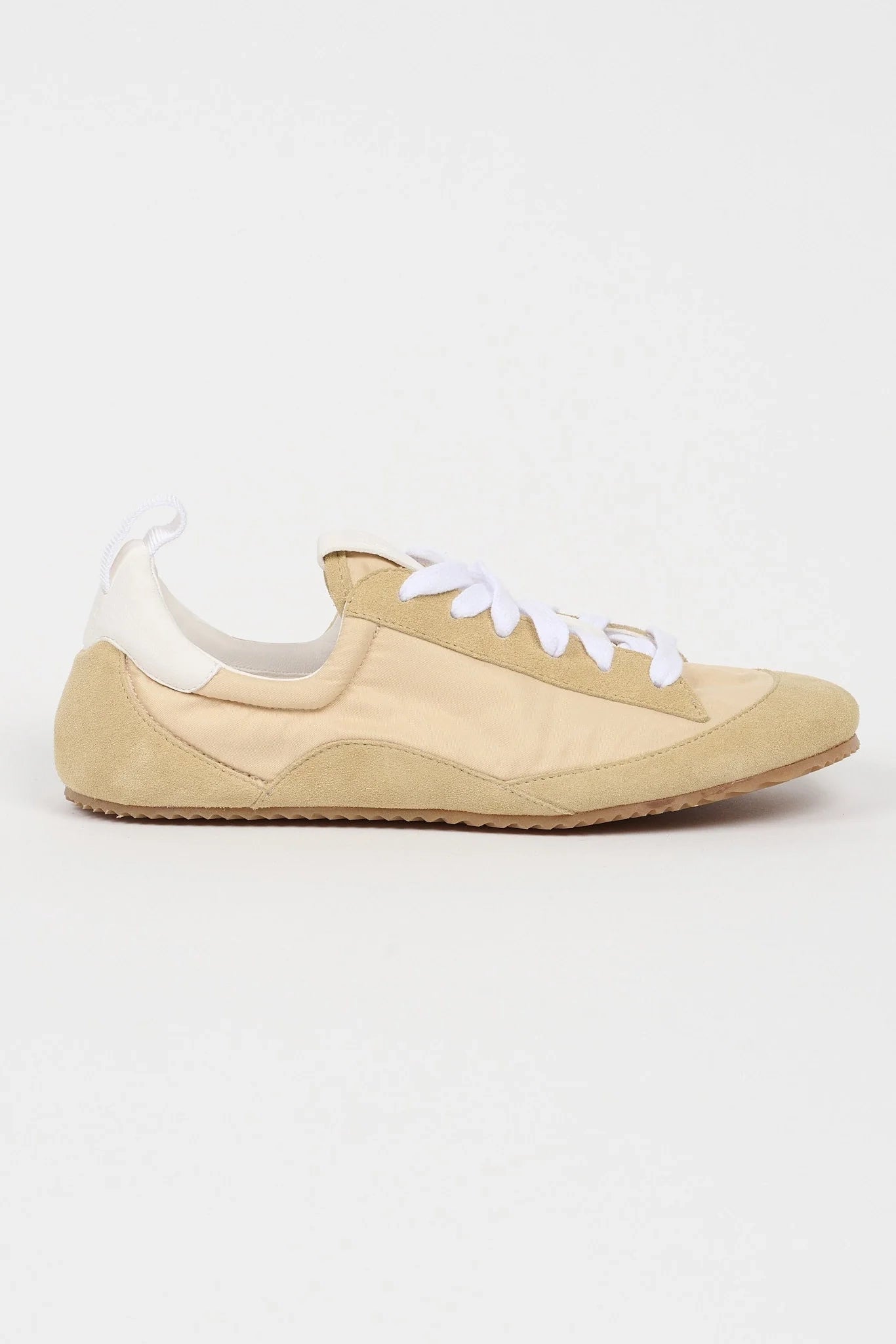 Beige Jamie Haller Sacchetto sneaker in textured Italian nylon and suede on white background