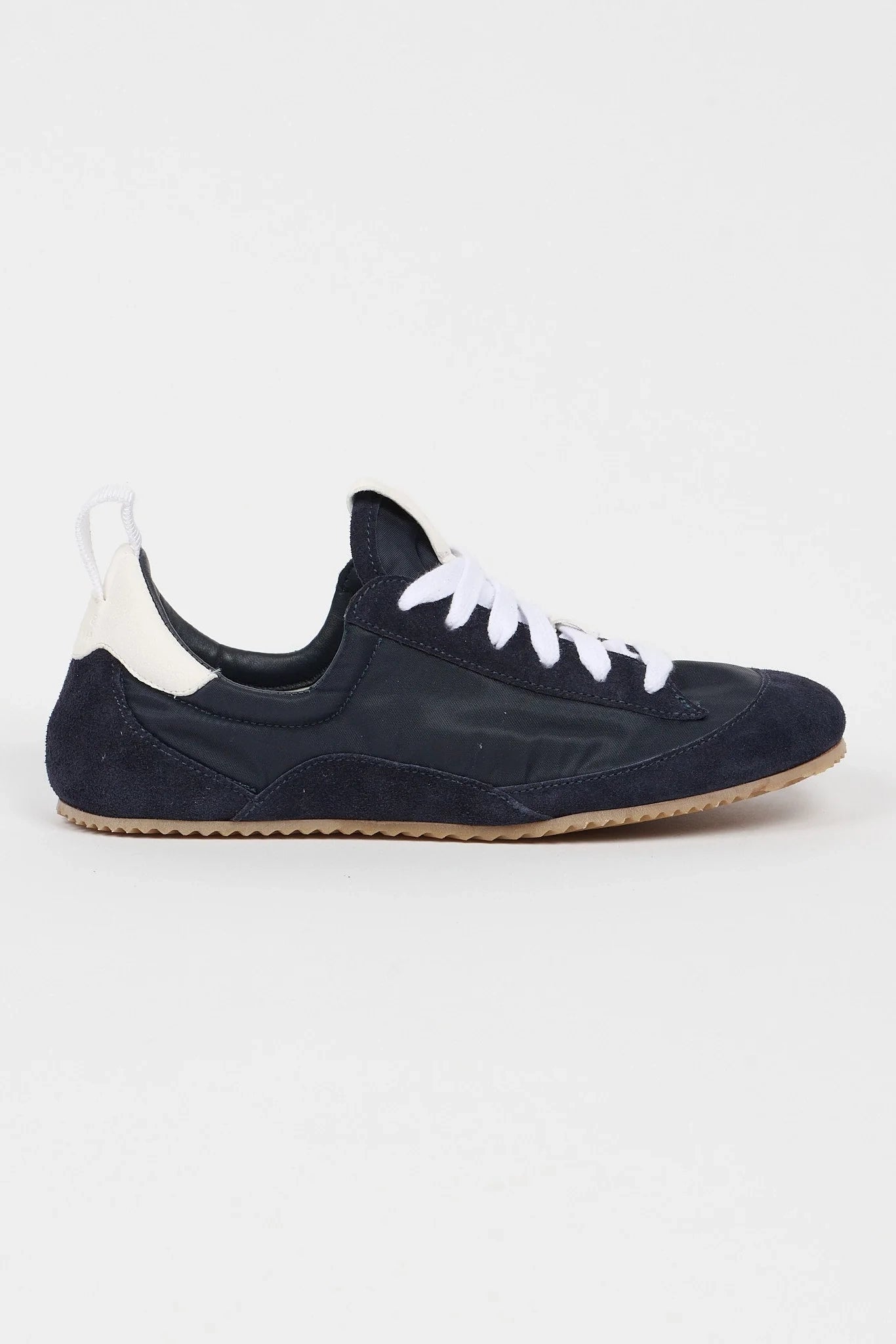 Jamie Haller Sacchetto sneaker in navy textured nylon and suede with a low-profile silhouette, lace-up closure and flexible rubber sole.