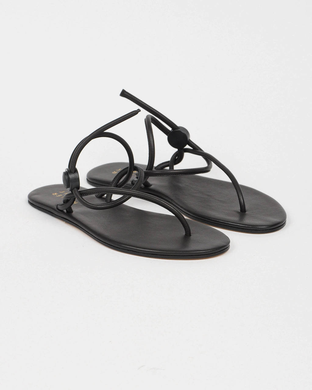 Jamie Haller String Theory sandal in black.