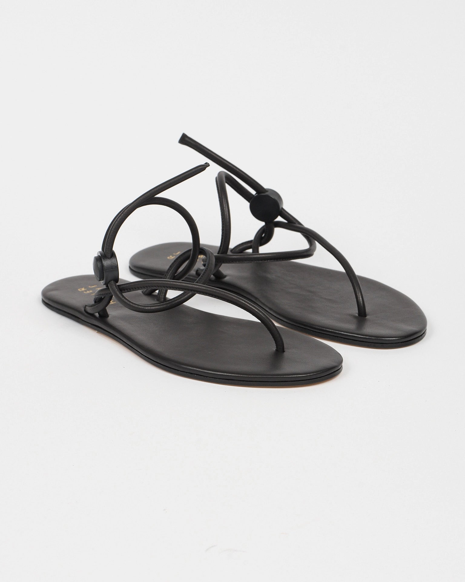 Jamie Haller String Theory sandal in black.