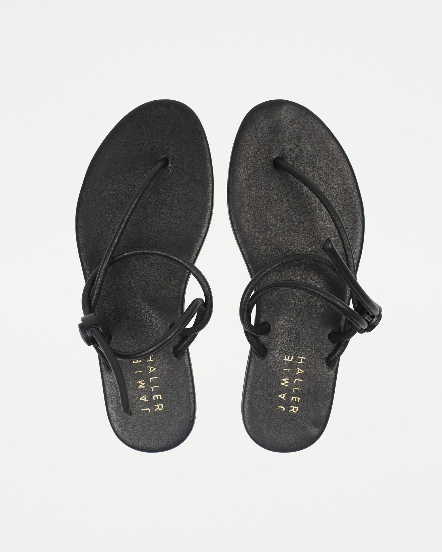 Jamie Haller String Theory sandal in black.