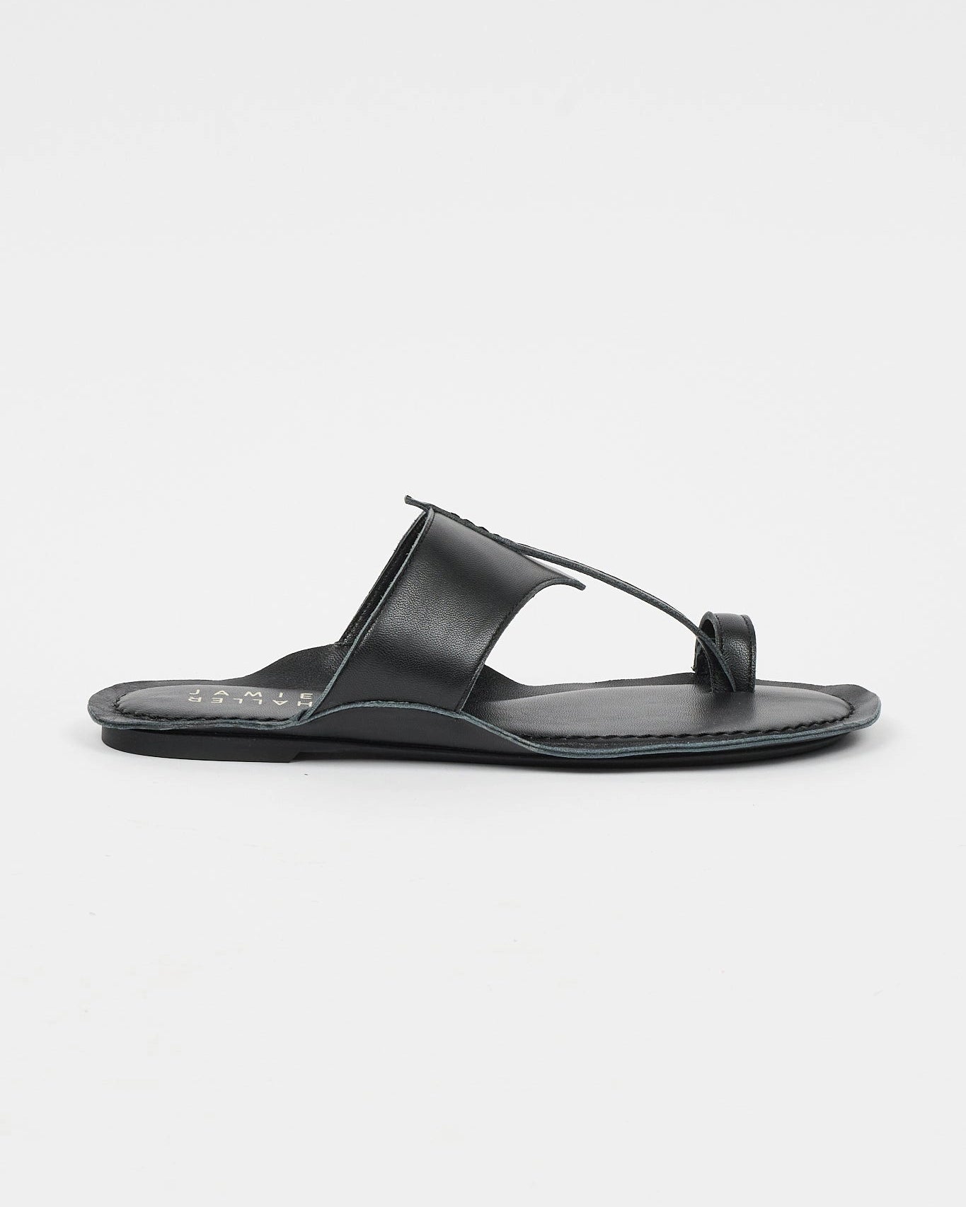 Side view of Jamie Haller Toe Thong sandal in black