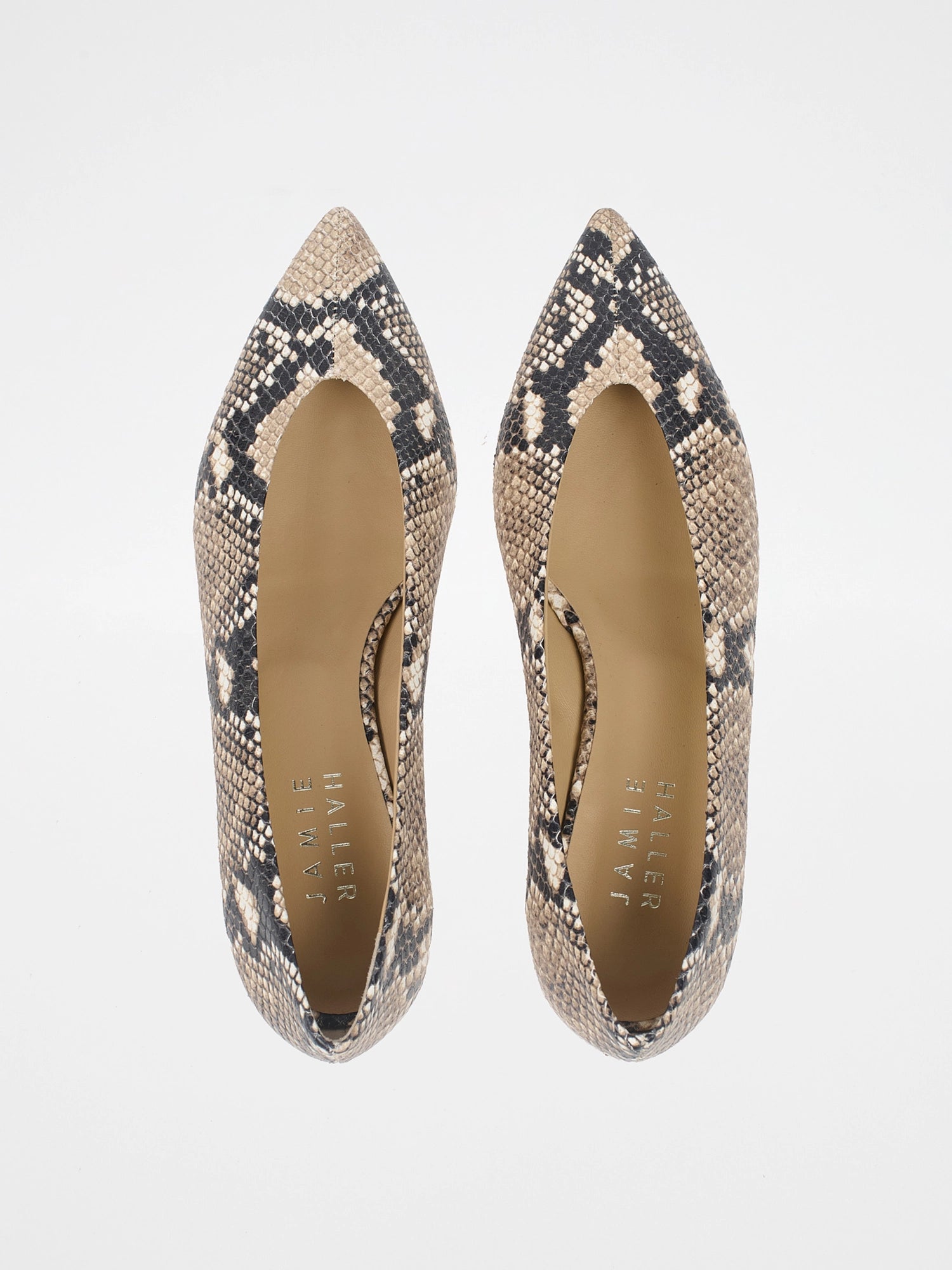 Pair of pointed-toe shoes with snake print on a light gray background