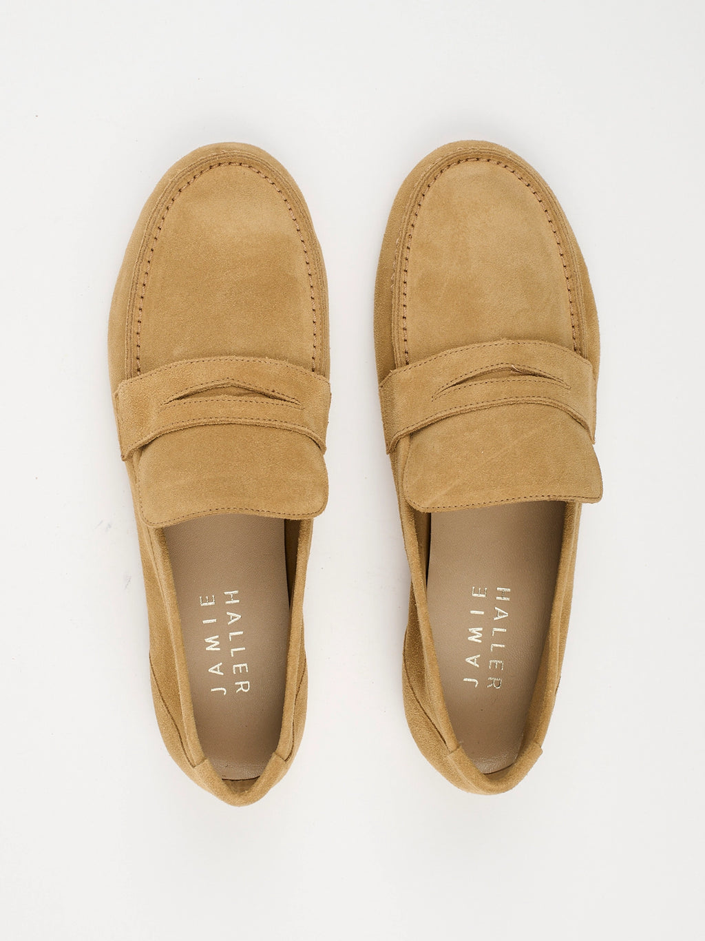 Jamie Haller unlined penny loafer in ambra suede with a warm tan tone, low-profile silhouette and flexible construction.
