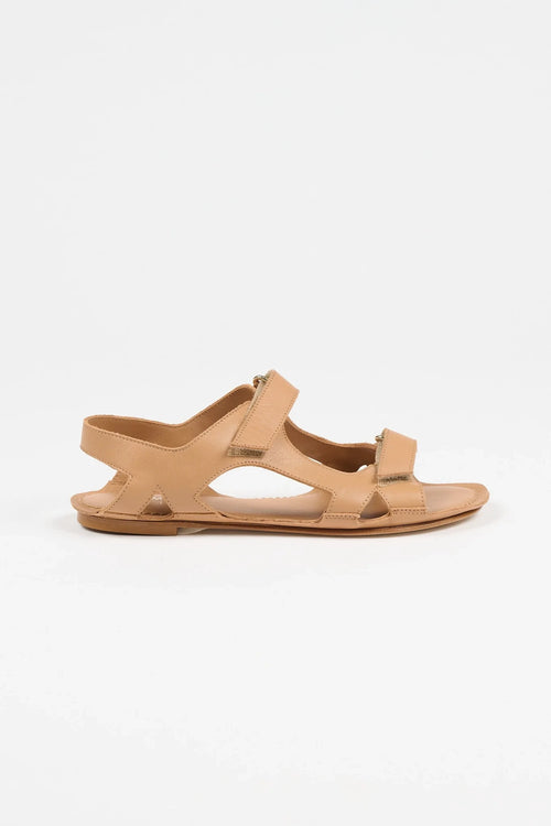 Jamie Haller walking sandal in  natural Italian calfskin with intersecting cutout straps, velcro closures and a flat leather sole.