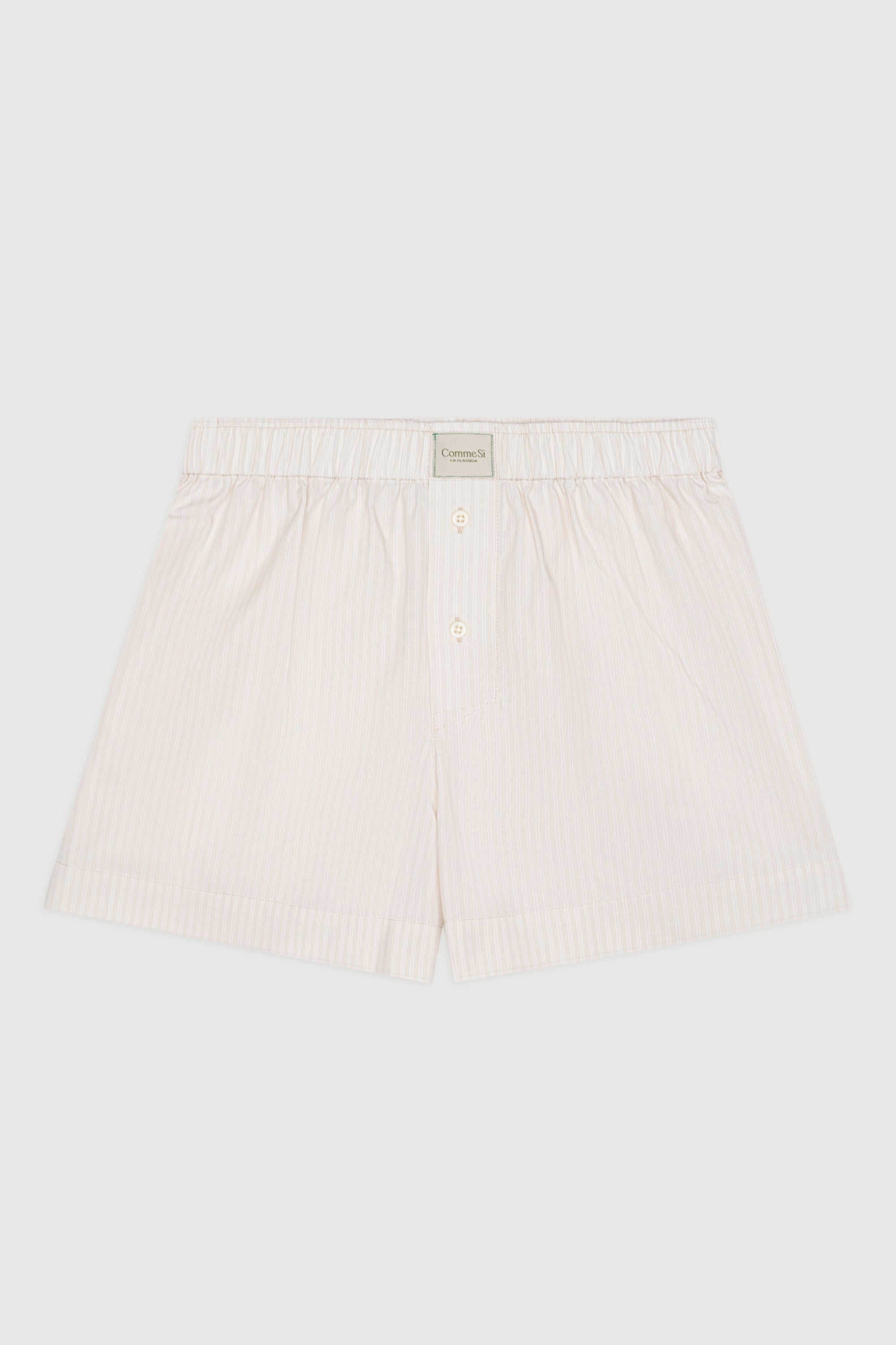 Flat lay of Comme Si La Boxer Classica in Alabaster Stripe, showing relaxed fit, covered elastic waistband, and Italian cotton poplin fabric.