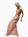 NOMIA paneled maxi bias dress in poppy floral chiffon with contrast piping, fitted through the bodice with a fluid full-length skirt and asymmetric hem