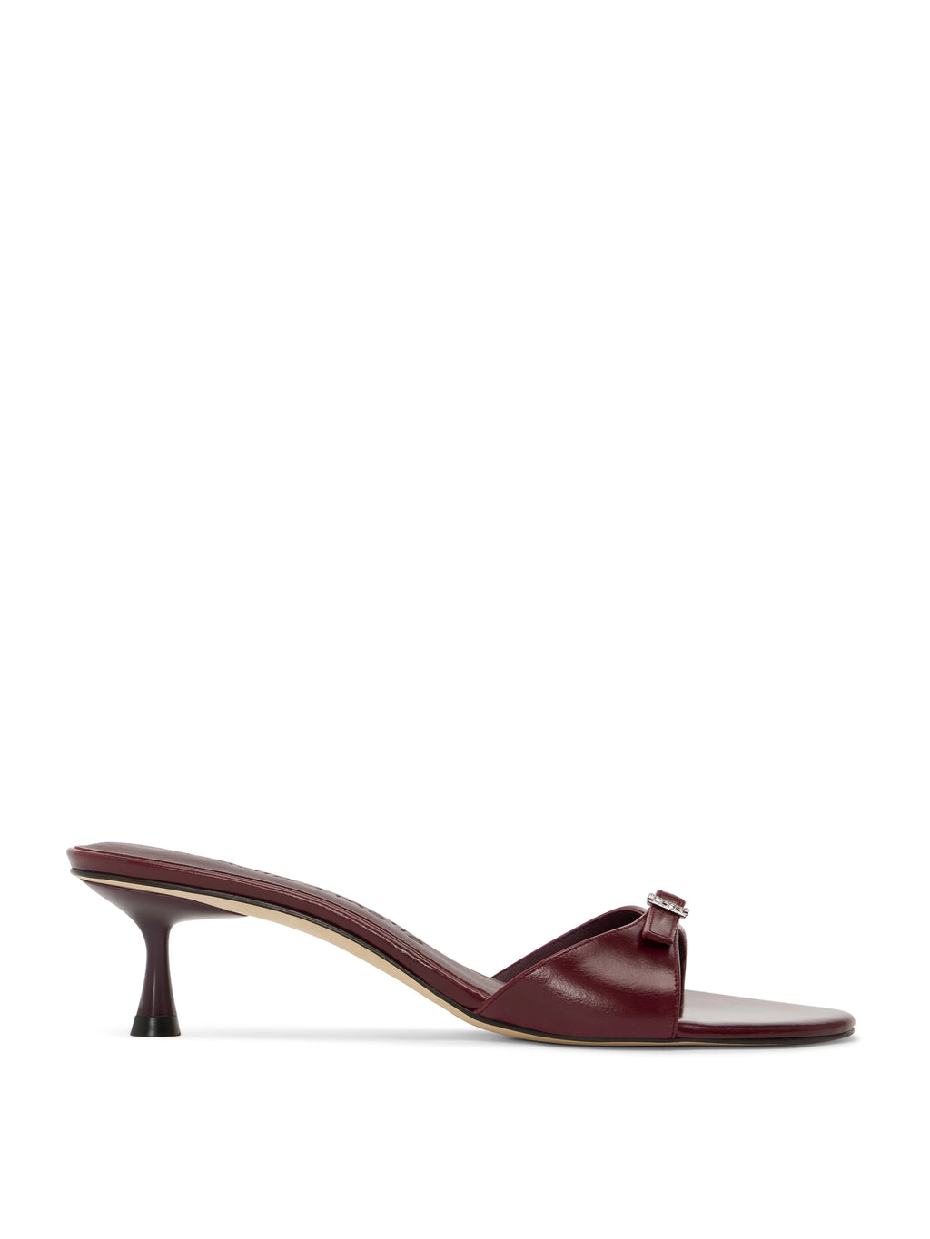 Burgundy sandal with a thin heel on a white background