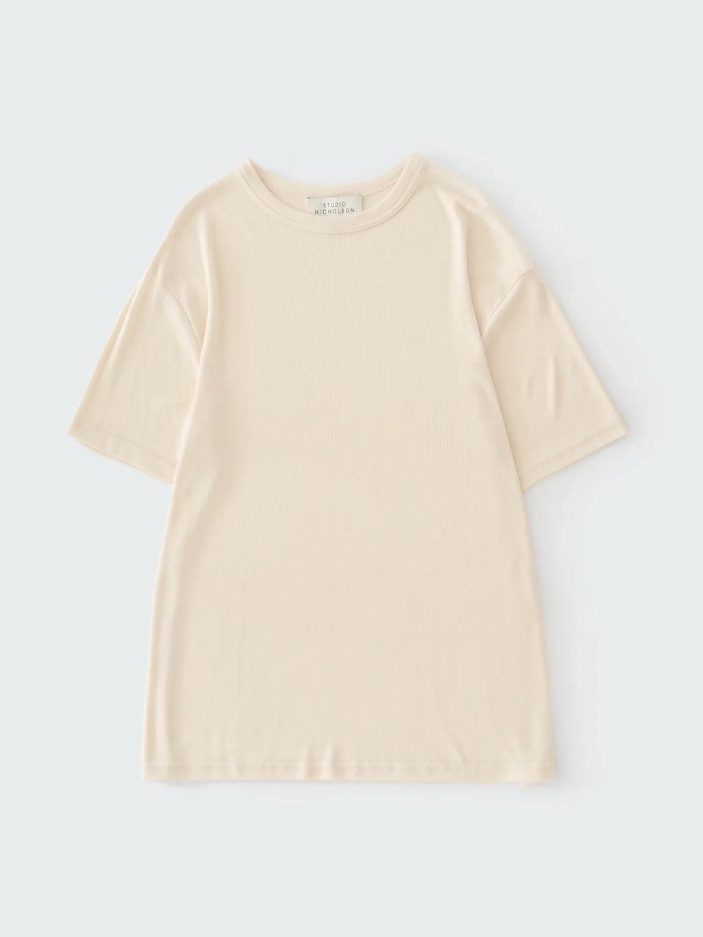 Beige t-shirt on a light gray background