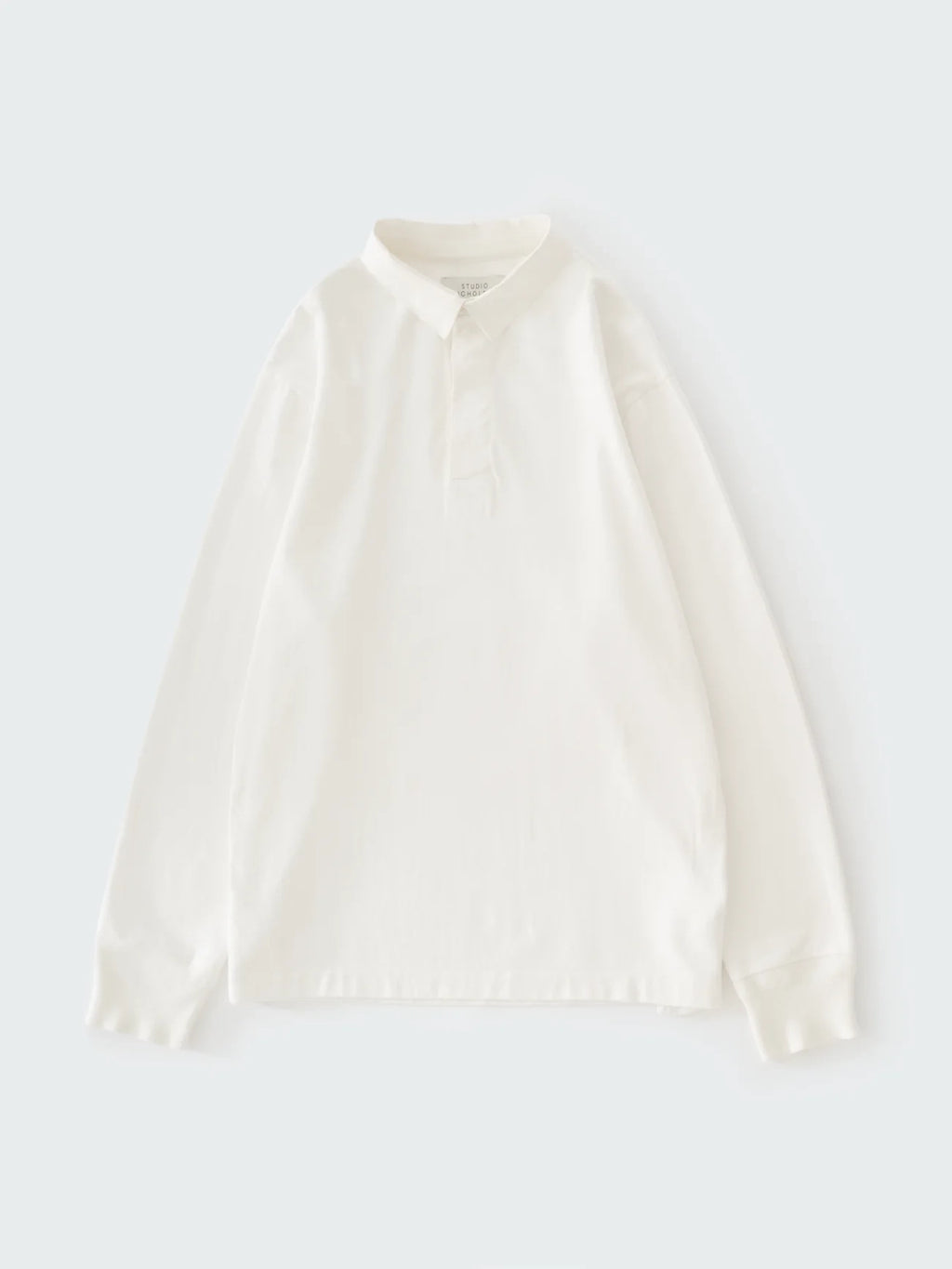 White blouse on a light gray background