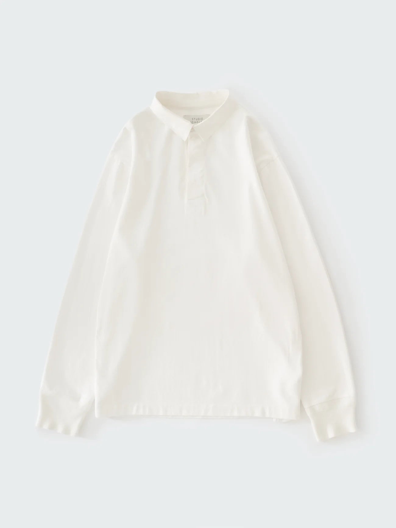 White blouse on a light gray background