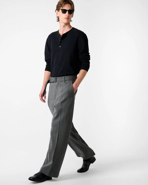 Model wearing Studio Nicholson Barlow black leather mule with a slip-on design and low stacked heel.