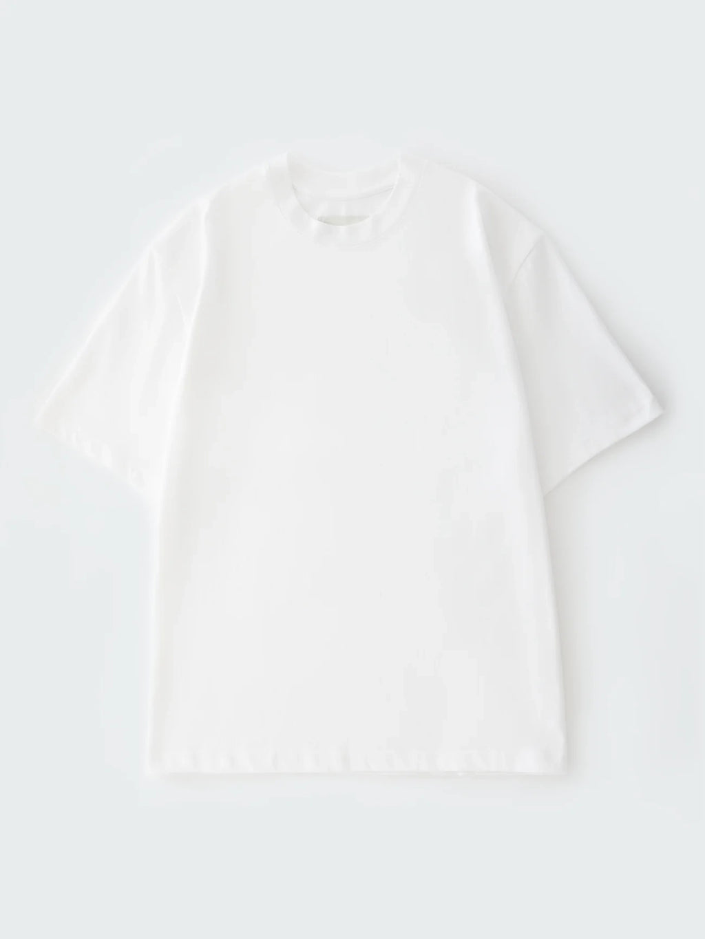 White blouse on a light gray background