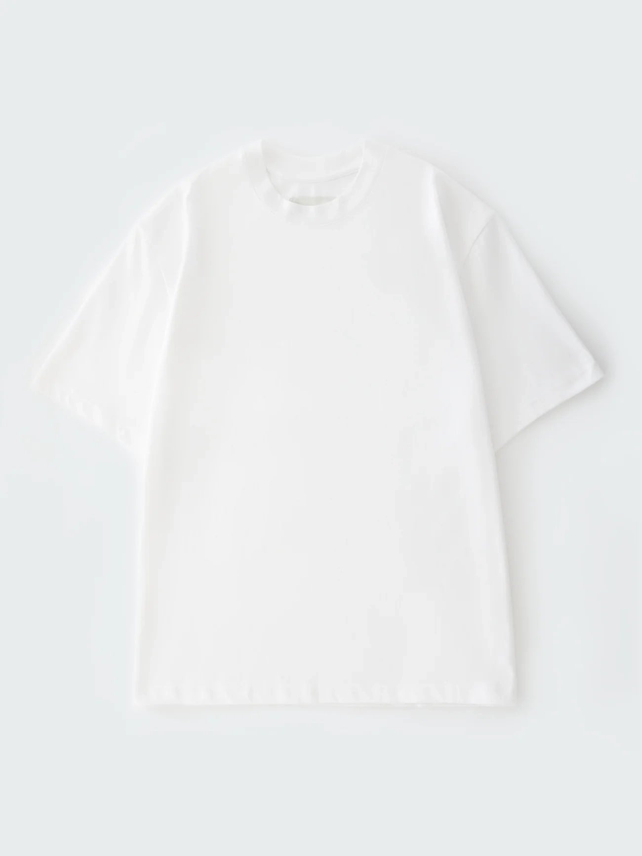 White blouse on a light gray background