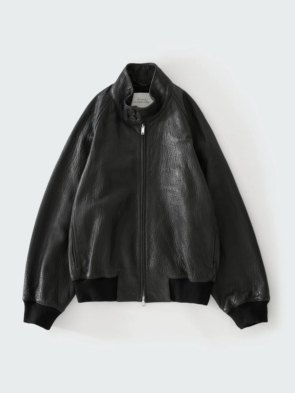 Black leather jacket on a white background