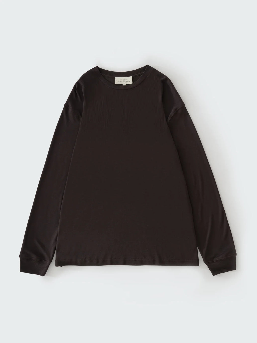 Black long-sleeve shirt on a light gray background