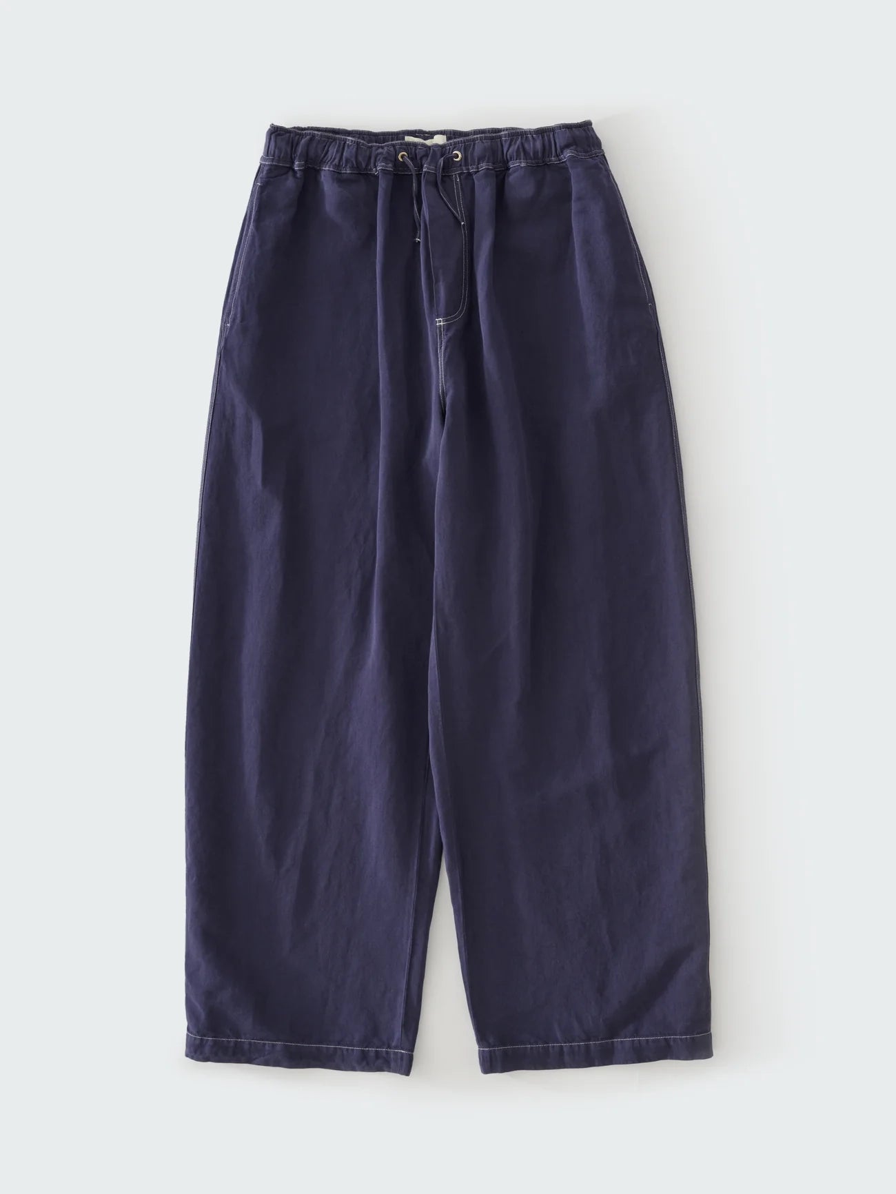 Navy blue pants on a white background