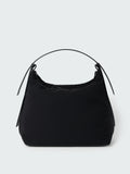 Black handbag on a light gray background