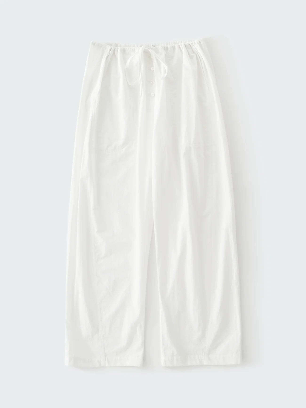 White satin slip skirt on a light gray background
