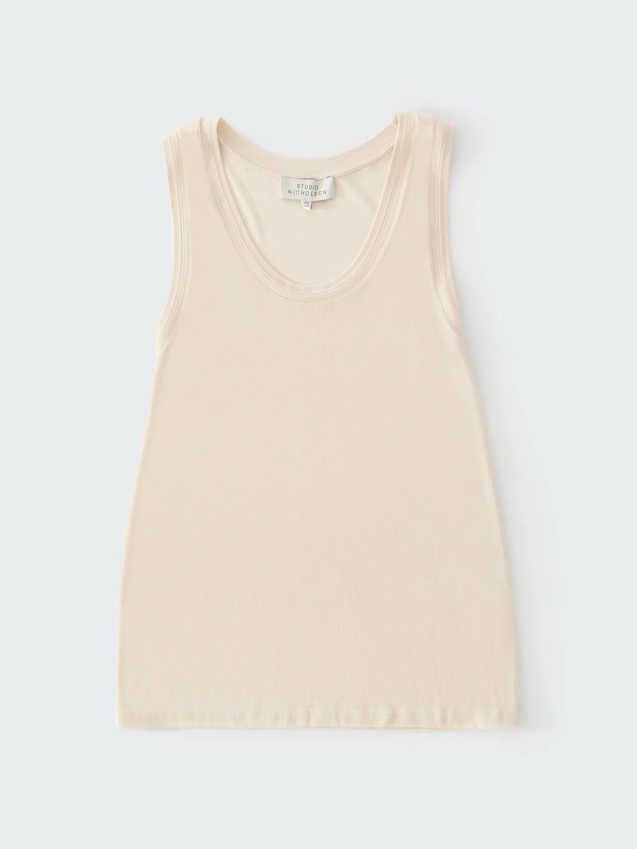 Beige tank top on a white background