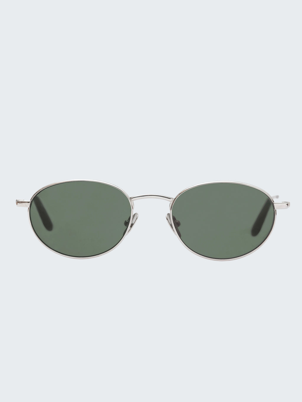 THISTLES CRUZ sunglasses in silver titanium with an oval wire frame silhouette and dark green G15 lenses.
