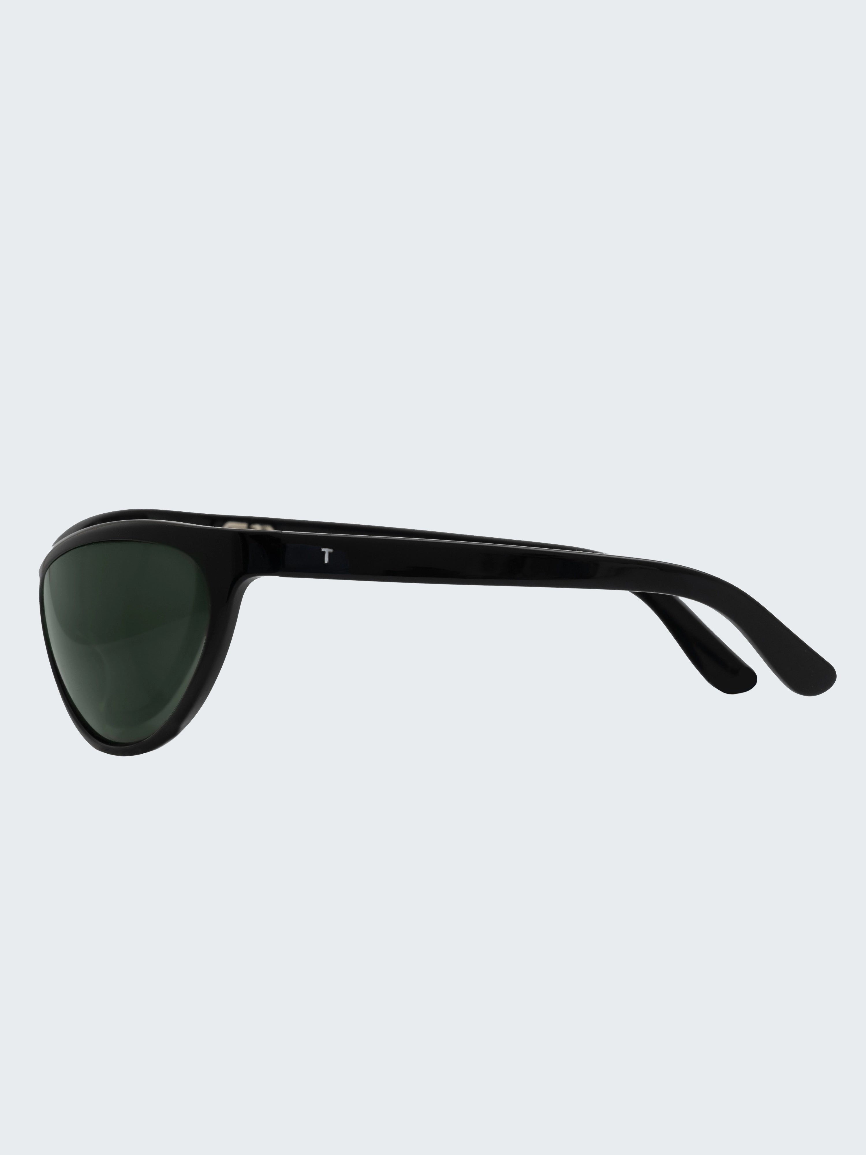 THISTLES LEX sunglasses in black acetate with a narrow wrap silhouette and dark green G15 lenses.