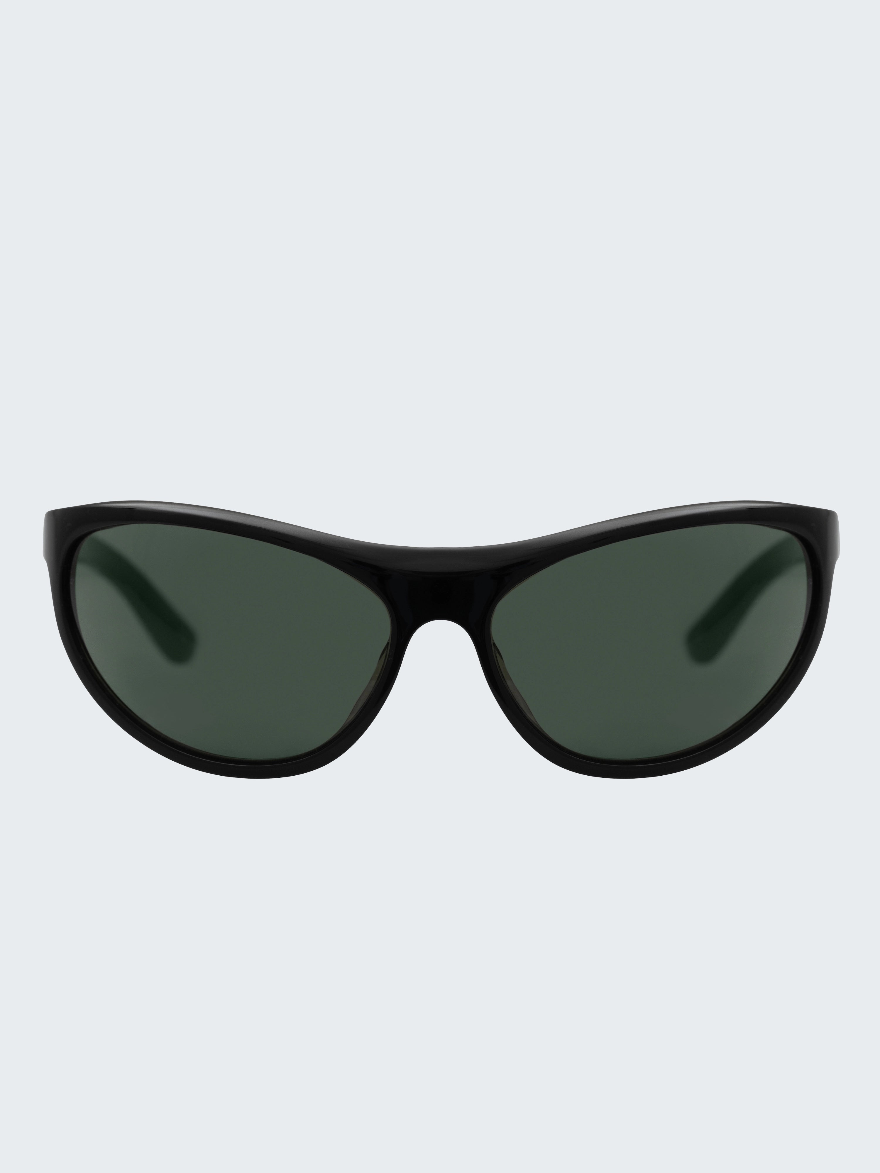 THISTLES LEX sunglasses in black acetate with a narrow wrap silhouette and dark green G15 lenses.
