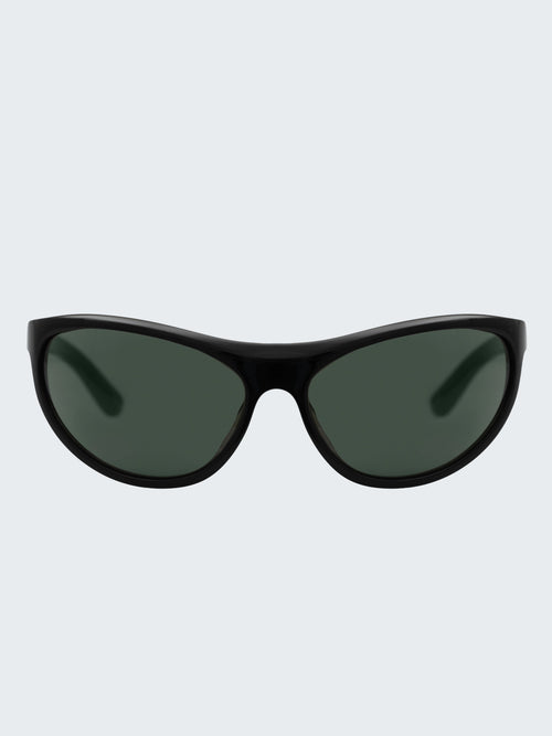 THISTLES LEX sunglasses in black acetate with a narrow wrap silhouette and dark green G15 lenses.