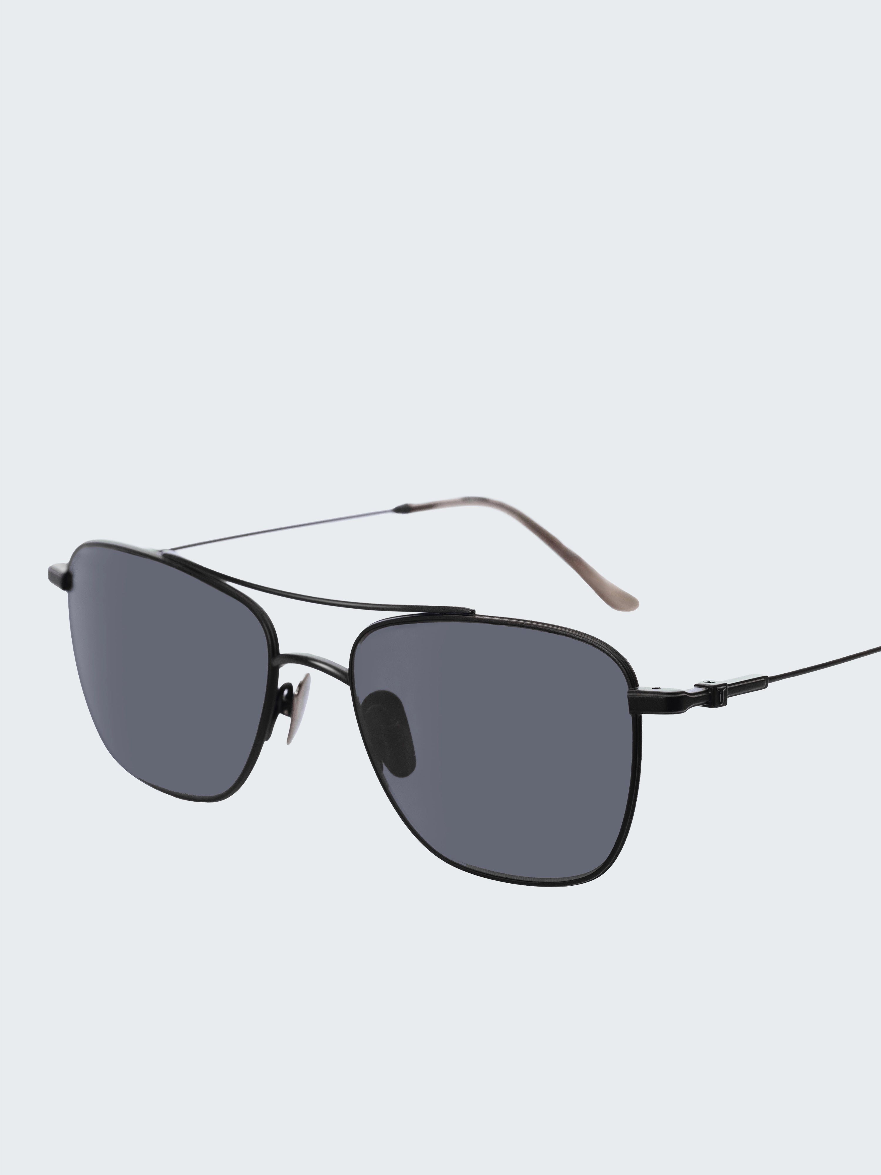 THISTLES MALONE sunglasses in black titanium with a rectangular wire frame, double brow bar and dark lenses.