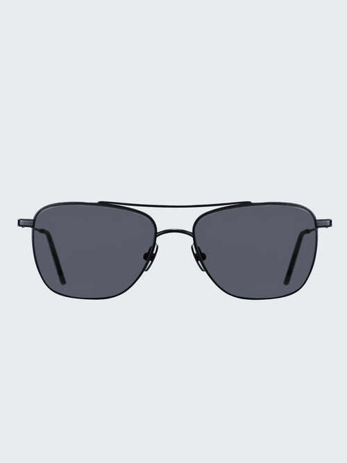 THISTLES MALONE sunglasses in black titanium with a rectangular wire frame, double brow bar and dark lenses.